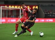 Unai Emery reportedly wants James Rodriguez(l) to replace Mesut Ozil(r)